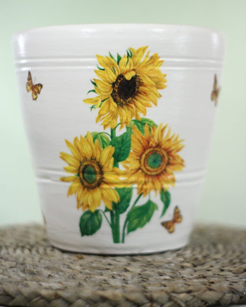 White terracotta plant pot with hand-painted sunflower and butterfly design – decorative indoor flower pot for home or garden décor.